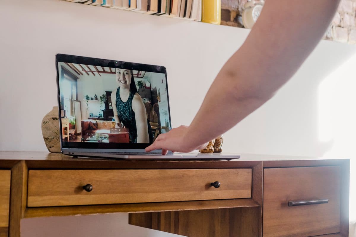 A participant joining a video conversation on a laptop
